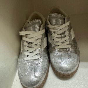 Silver sneaker shoes